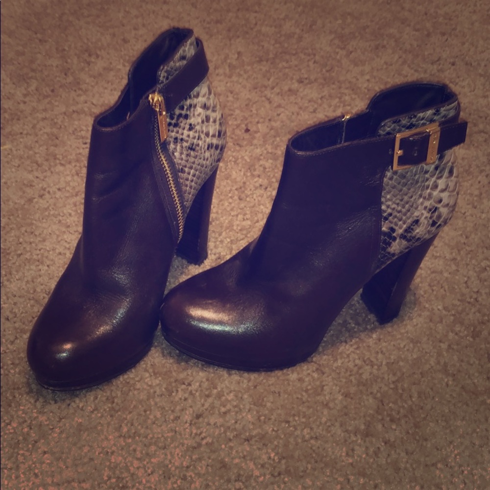 Micheal Kors heeled boots. Leather
